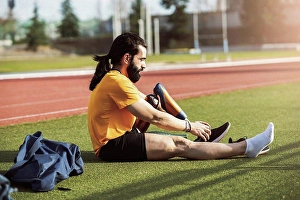 Handicapped Prints: Bearded man wearing shoes on prosthetic leg