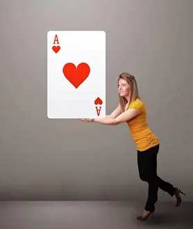 Cards Prints: Beautifu Frau hält ein rotes Herz ace Beautifu young woman holding a red heart ace LicenseRF