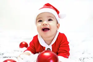Hood Prints: beautiful baby dressed as santa claus