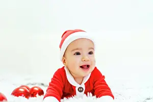 Hood Prints: beautiful baby dressed as santa claus at christmas