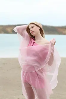 Chic Prints: Beautiful blond girl in pink on the beach