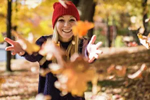 Weather Prints: Beautiful blonde woman throwing leaves
