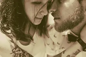 Relationships Prints: beautiful couple close up beautiful couple embraced and gently rubs noses
