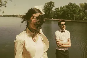 Relationships Prints: beautiful couple close up beautiful couple posing on the background of the lake