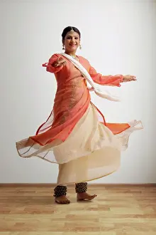 Expressions Prints: Beautiful kathak dancer performing at home