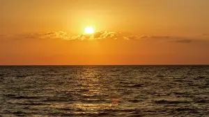 Florida Prints: Beautiful orange sunset over the Gulf of Mexico from Anna Maria Island