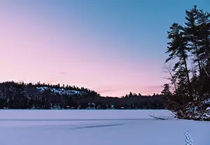 Beginning Prints: Beautiful sunrise on a frozen lake in winter in Ontario, Canada