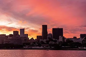 Brazil Prints: Beautiful sunset view to orange clouds over downtown buildings