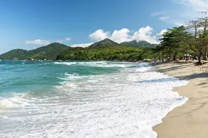 Brazil Prints: Beautiful view to green rainforest and blue water wild beach