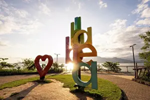 Brazil Prints: Beautiful view to Ilhabela big touristic heart and letter monument