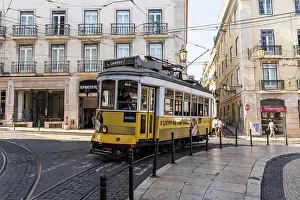 Public Transport Prints: Beautiful view to old historic electric street tram and buildings