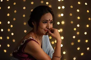 Celebrating Prints: Beautiful woman blushing after getting a compliment
