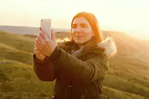 Cellphone Prints: Beautiful woman in outdoor making a selfie