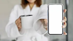 Assorted Prints: Beautiful woman showing blank phone. High resolution photo