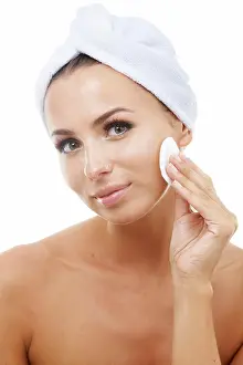 Dermatology Prints: Beauty, portrait or woman in studio with cotton pad on face