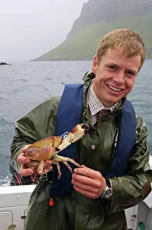 Crab Prints: Benmore Estate ghillie, Donald Bissett, shows off a crab caught in a pot on Loch na Keal