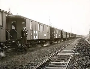 Uniform Prints: Berlin, Germany: c. 1916 A German Red Cross hospital train with its attendants prepares to leave for the battlefront