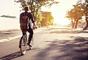 Cycling Prints: Bicycle, transport and back of man in road with lens flare for exercise