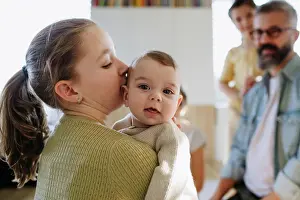 Responsible Prints: Big sister holding small little brother in her arms