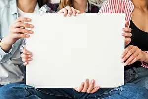 Student Prints: Big white sheet paper holding by women