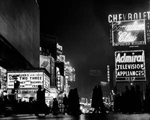 Commercial Sign Prints: Billboards in a street lit up at night