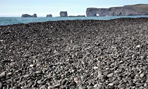 Waves Prints: Black beach at Reynisdrangar with Dyrholaey in the distance, near Vik, Iceland