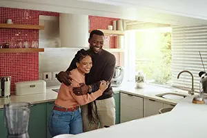 Laugh Prints: Black couple, happy home and love while together with care and happiness in a marriage with commitment and care