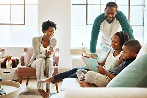 Pajamas Prints: Black family, reading book and children on couch in home