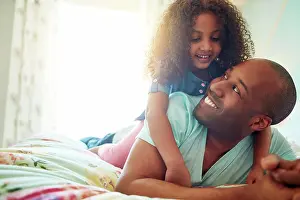 Carry Prints: Black father, girl and piggyback for love relationship with trust and care for fun in bedroom