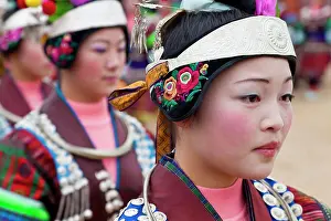 Intricate Prints: Black Miao girls dancing at festival, Kaili, Guizhou Province, China