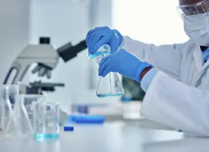 Forensic Prints: Black person, scientist and liquid in beaker for testing
