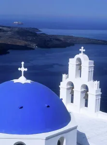 Whitewashed Prints: Blue dome roof of church near sea, Santorini, Greece