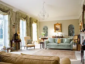Sitting Rooms Prints: Blue-green sofa in country drawing room with swagged curtains