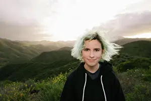 14 16 Years Old Prints: Blue Haired Teen Girl On Top Of A Mountain At Sunset