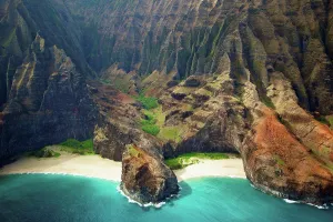 Inlet Prints: Blue Water And White Sand In A Small Inlet Along A Rugged Coastline;Hawaii United States Of America