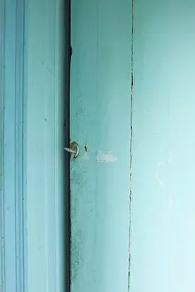Unknown Prints: A blue wooden door