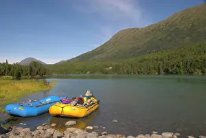 Paddle Prints: A blue and a yellow rubber raft on the Kenai River along the Sterling Highway in Alaska