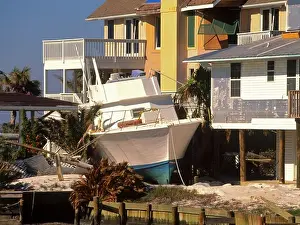 Waves Prints: Boat Relocated At Back Door by Hurricane Ivan
