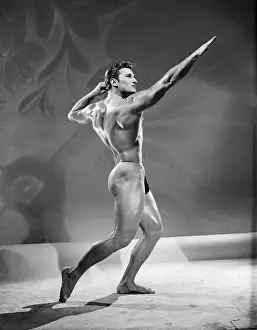 Bodybuilder Prints: Bodybuilder In Archer Pose c.1956
