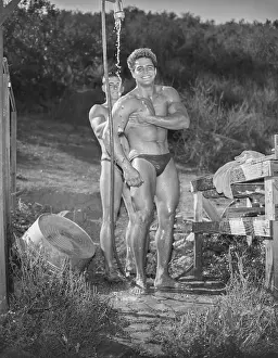Attractive Prints: Bodybuilder Showers Outdoors with Friend c.1953