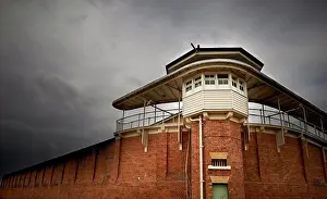Queensland Prints: Bogo Road Gaol watch tower against stormy sky