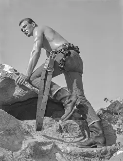 Jeans Prints: Booted Lineman Climbing on Mountain c.1964