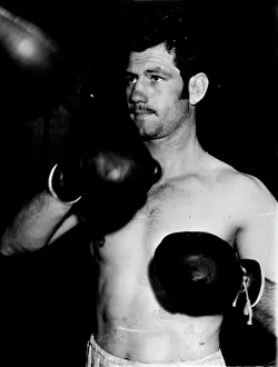 Boxer Prints: Boxer Bronco Don Johnson will be ordered to trim his side whiskers. December 16, 1954
