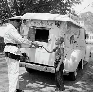 Customer Prints: Boy buying ice cream from vendor