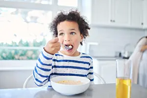 Breakfast Prints: Boy, child and breakfast cereal in home