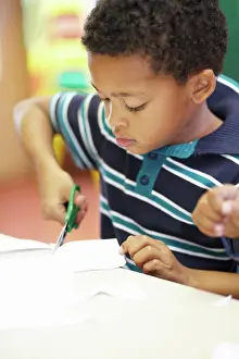 Notebook Prints: Boy, classroom and scissor for cutting paper with learning