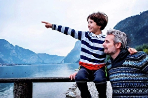 Amuse Prints: Boy and father pointing from lakeside pier, Lake Como, Onno, Lombardy, Italy