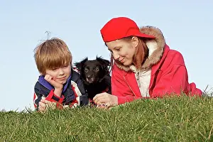 With Each Other Prints: Boy and girl with a dog