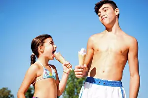Radius Images Prints: Boy and Girl eating Ice Cream Cones, Lampertheim, Hesse, Germany. 09/06/2013