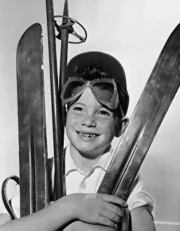 Shoulders Prints: Boy holding skiing equipment